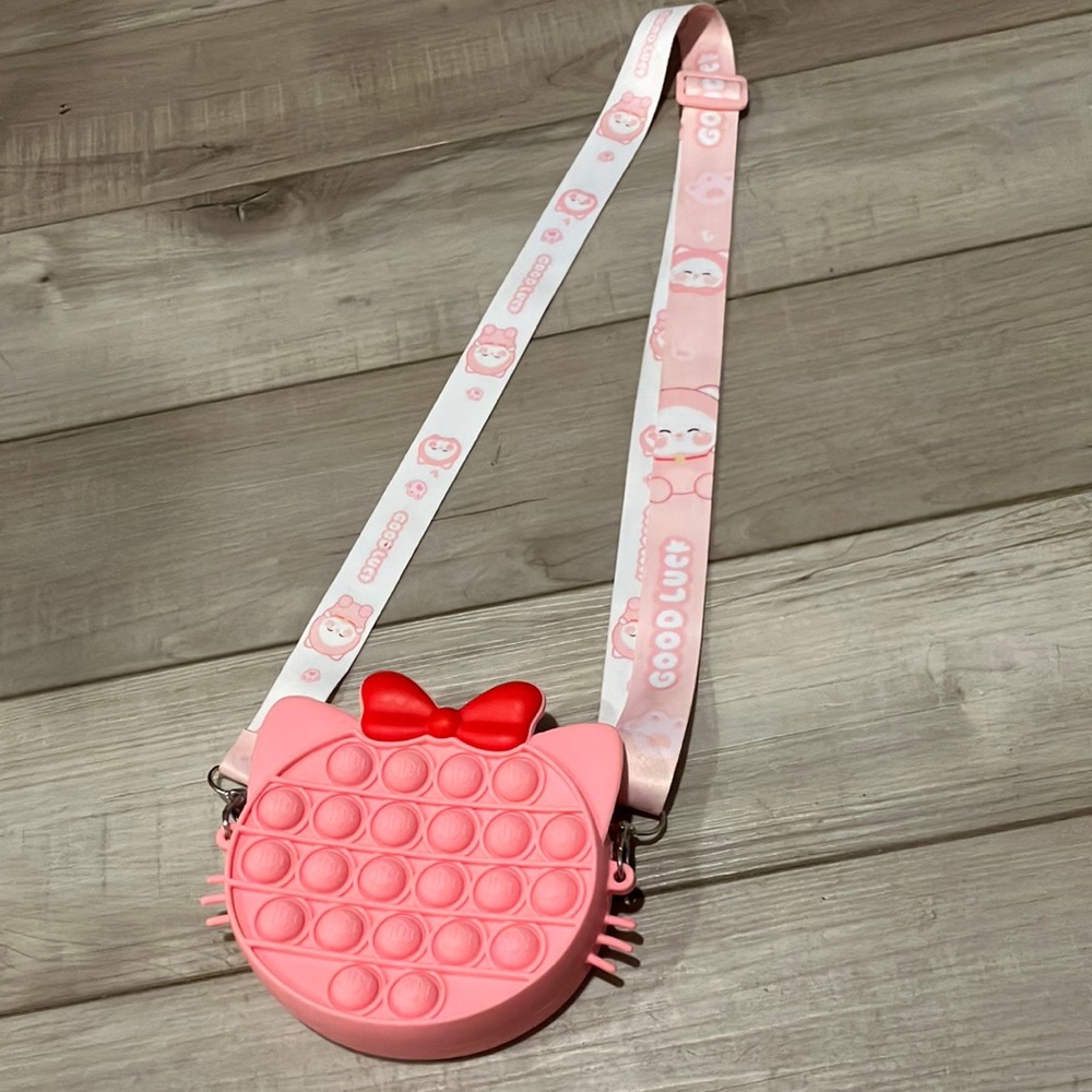 Hello kitty pop it purse